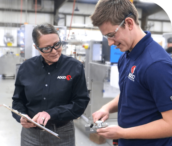 Two ADCO team members